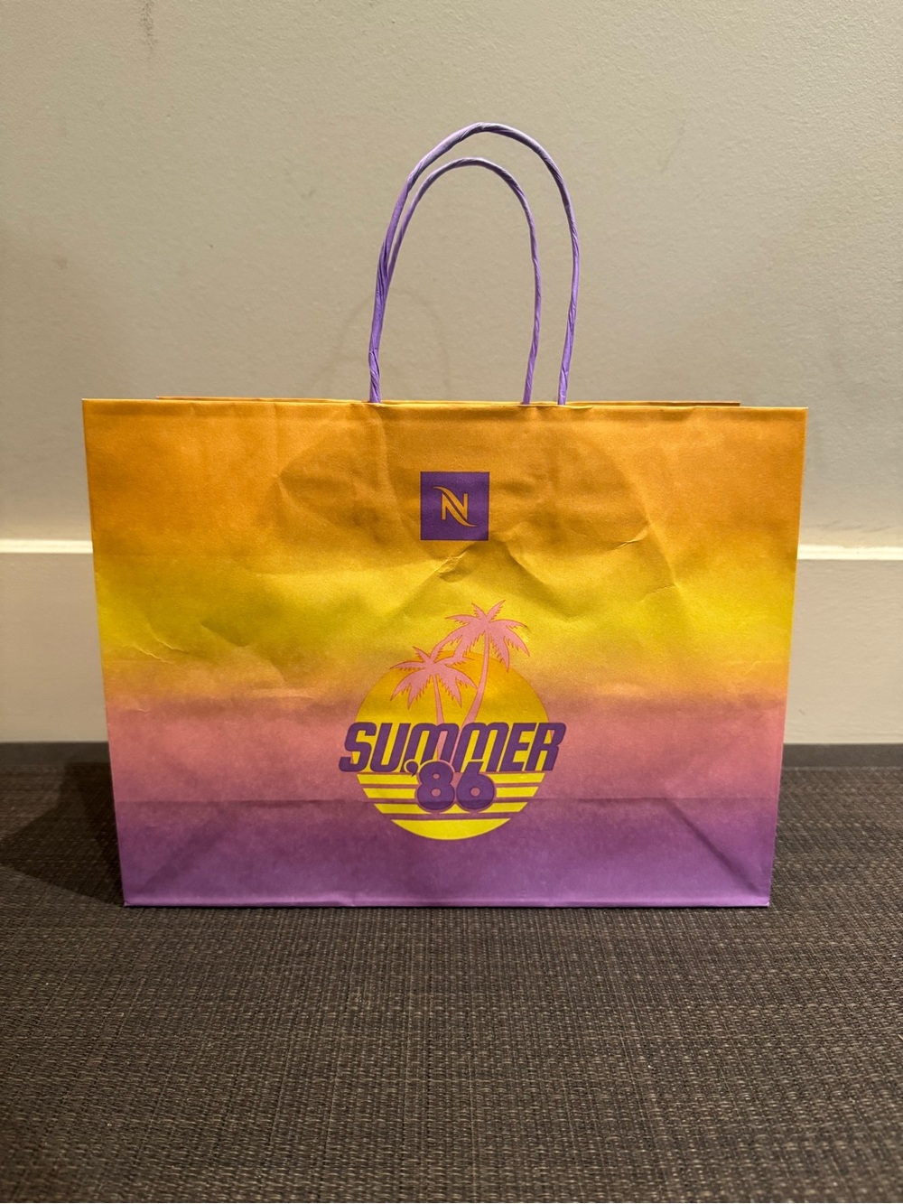 Nespresso limited-edition "Summer '86" collection paper shopping bag